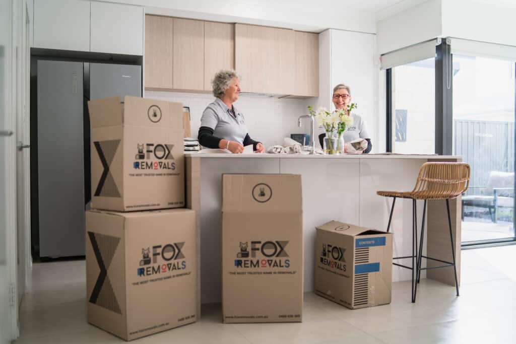 Fox Removals team packing a kitchen for a house move